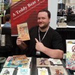 Buy my book at the Teddy Bear Tales Awesome Con table.