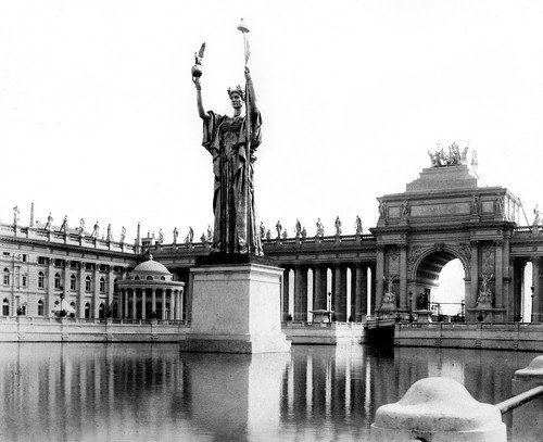 At the center of the exposition's Court of Honor was the Statue of the Republic, designed by Daniel Chester French. The expo was held in Jackson Park and the Midway Plaisance. A replica of the statue now stands in Jackson Park.