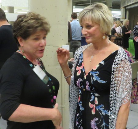 Arkansas author, Darcy Pattison talking with Catherine Coulter. 