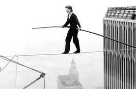 . . . up on a tight rope/one side's pain and one is hope. . . 