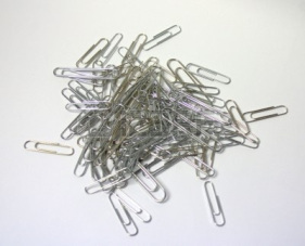 2765415-paper-clip-pile-on-a-white-background