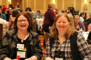 Sheila Connolly and Barb Ross speed dating in 2013.