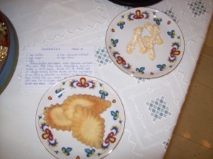 Sandbakkel cookies and kransekake strips.