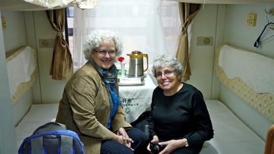 Me and my cabin mate on a train in China.