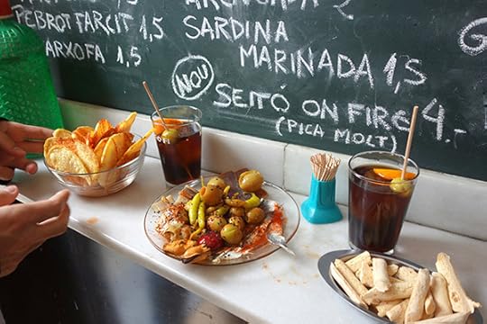 Last week I posted about a food tour I enjoyed in Porto, Portugal. Food tours— offering a mobile feast with several stops to sample a variety of local flavors for about the cost of a splurge dinner, all thoughtfully explained by a local guide — are a big trend across Europe. In Barcelona, as in many places, vermouth bars are all the rage these days. And as this photo shows, a refreshing glass of vermouth is complemented by a plate of local taste treats. Especially in Spain, this “tapas” style of eating and drinking makes for fun meals.
