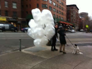 Balloons on windy 7th Avenue