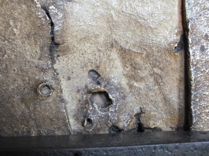 Sacristy Door Arrow Holes