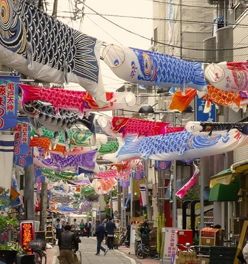 Carp flags school over the shopping street in Kameido