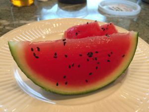 Doggy watermelon snacks (made with watermelon, gelatine, and black sesame seeds).