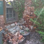 Adorable little building in the corner of the garden.