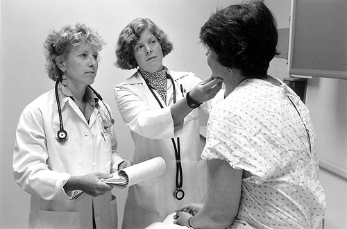 Doctors with patient, 1999