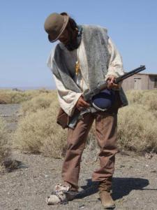 jaredwithrifleguitarstyle
