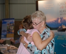 Louise Hay hugging fan