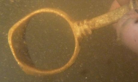 A combined signet ring and pipe-tamper recovered from the wreck of the London