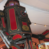 Thomas Willeford of Brute Force Studios built a 16-foot robot for the Steampunk World's Fair. The statue towered above on-lookers under the tent of the fair's