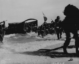 Men of 163rd Infantry Regiment hit the beach from Higgins boats during the invasion of Wadke Island, New Guinea, 18 May 1944 (US National Archives)