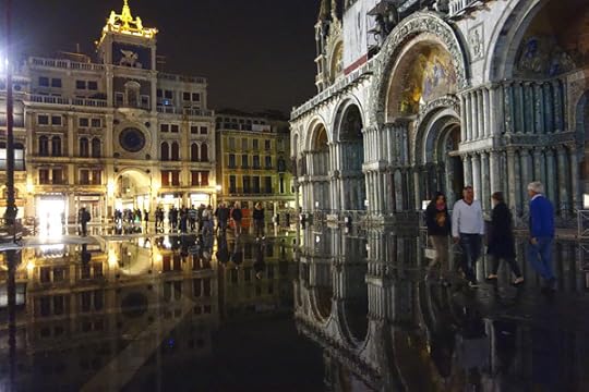 Each year, as Venice sinks and the sea rises, floods are more common. [Flooded St Mark moors]The lowest part of the city — St. Mark's Square — floods first. And tonight, it became a delightful reflecting pond.