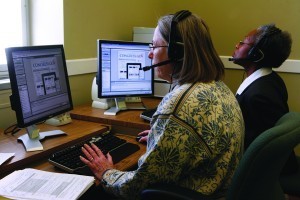Library staff members Judy Graves and Pamela Craig conduct a webinar on Congress.gov. 2013. Photo by Abby Brack Lewis.