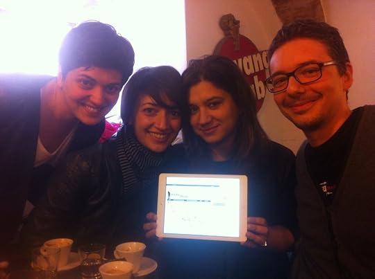 The Monithon team shows off their website in a cafe in Perugia