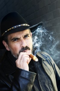 http://www.dreamstime.com/stock-photo-bearded-man-smoking-cigar-image11989340