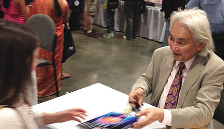 Dr. Kaku signs copies of his latest book for a crowd of fans at a recent book fair.