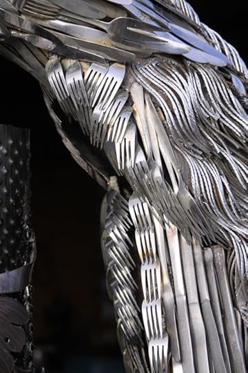 Detail of flatware peacock.