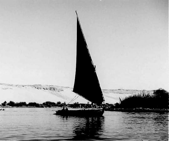 Nile felucca with Elephantine Island in the background, Aswan, Egypt, Africa