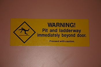 Caution sign for an open pit