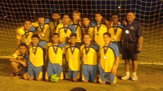 Photo: Tournament Champions again! (Only after going into overtime and then to penalty kicks to win the game). Go FC Garland!