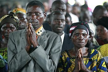 prayer distractions;Christians praying in Goma, DR of Congo.