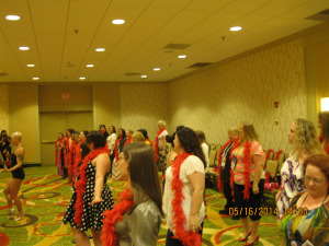 Because we hosted a burlesque dancing workshop. Trust me when I say sexy fun was had by all. No chickens were haqrmed in this event despite the floor was covered in red plumes.