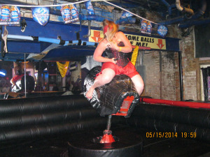 They ride mechanical bulls dressed as a pirate, holding in the goods.