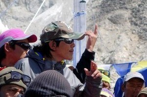 Pasang Tenzing Sherpa, one of the leaders of the protesters, incites the crowd during a speech