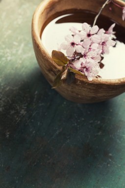 spring flowers in wooden bowl