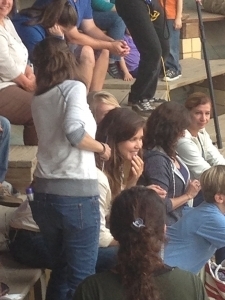 The hair stylist making sure Sarah is good to go!