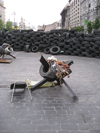 A barricade of tires prepared to be burned on Kyiv's main boulevard.