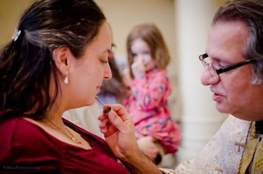 The author being chrismated. 