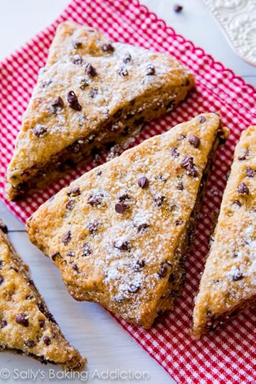 Melt-in-your-mouth chocolate chip scones! Tender and moist inside with a slight crunch on the edges. By sallysbakingaddiction.com