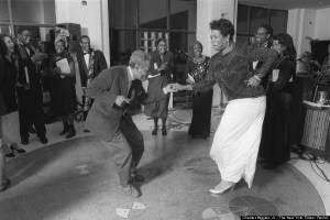 Amiri Baraka and Maya Angelou dance at the The Schomburg Center for Research in Black Culture in New York.