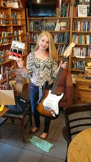 Jessica wins a guitar.