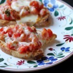 Broiled Bruschetta - Bruschetta made with prime summer tomatoes is absolutely out of this world. Put your feet up and enjoy this easy appetizer that can be made in advance and quickly prepped under the broiler.