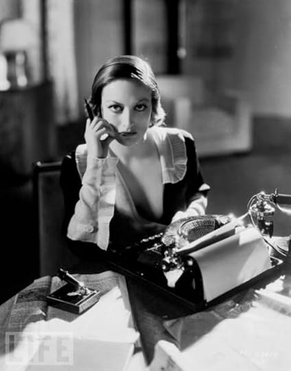Joan Crawford, with glam typewriter.