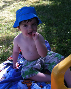 Emile enjoying cherries straight from the tree.