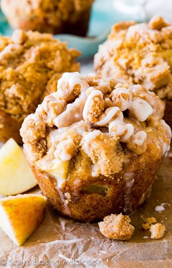 Big, buttery cinnamon apple muffins with a brown sugar crumb topping and sweet vanilla glaze. Better than a bakery! @sallybakeblog