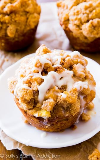 Big, buttery cinnamon apple muffins with a brown sugar crumb topping and sweet vanilla glaze. Better than a bakery! @sallybakeblog