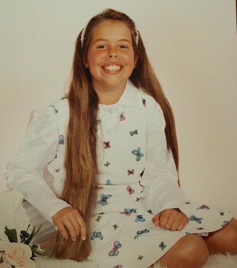 I didn't even want my hair in this photo, but the photographer wouldn't let me put it behind my back. I tried to sweep it back over my shoulders and she assumed I just loved having hair so uniquely long and hurried over to arrange it so it would be prominent. Such a good visual for me to see how far I've come.