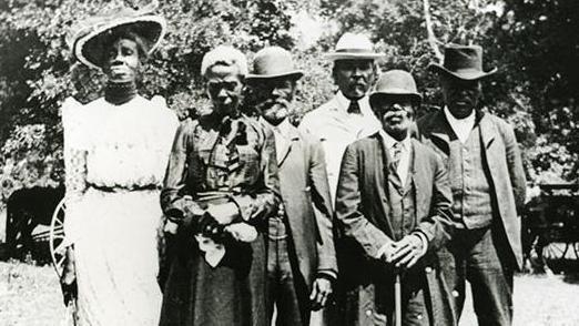 The official Juneteenth Committee in East Woods Park, Austin, Texas on June 19, 1900. (Courtesy Austin History Center, Austin Public Library) 