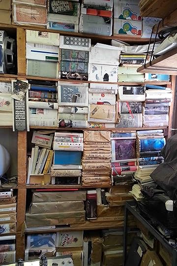Coach House Books walls lined with books.