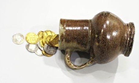 A dirty old jug with some glistening contents: the Lindsifarne Hoard