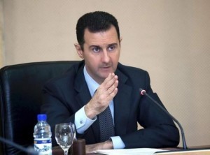 Syria's President Bashar al-Assad heads a cabinet meeting in Damascus